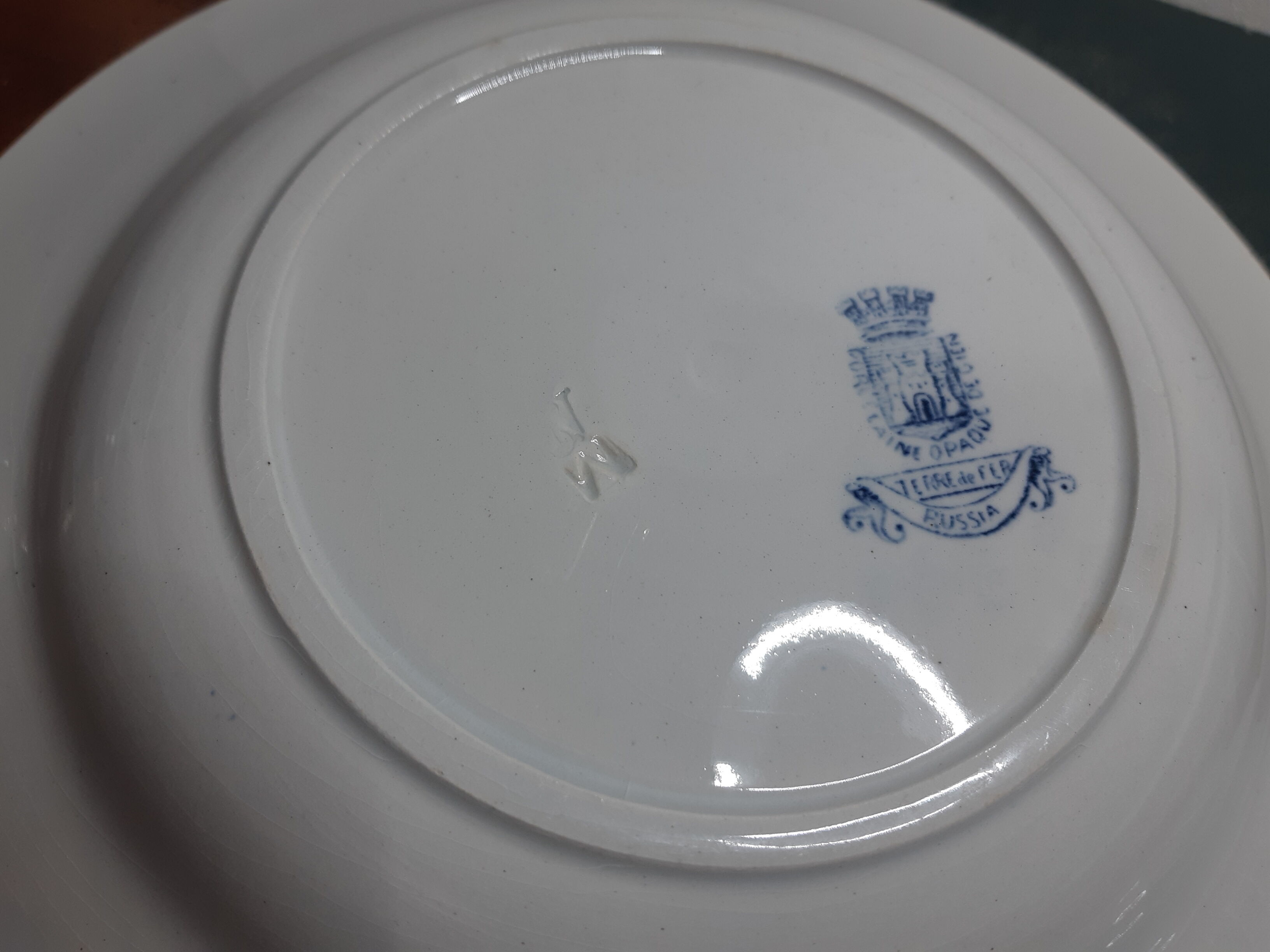 Hollow earthenware plates Iron Earth, Russia