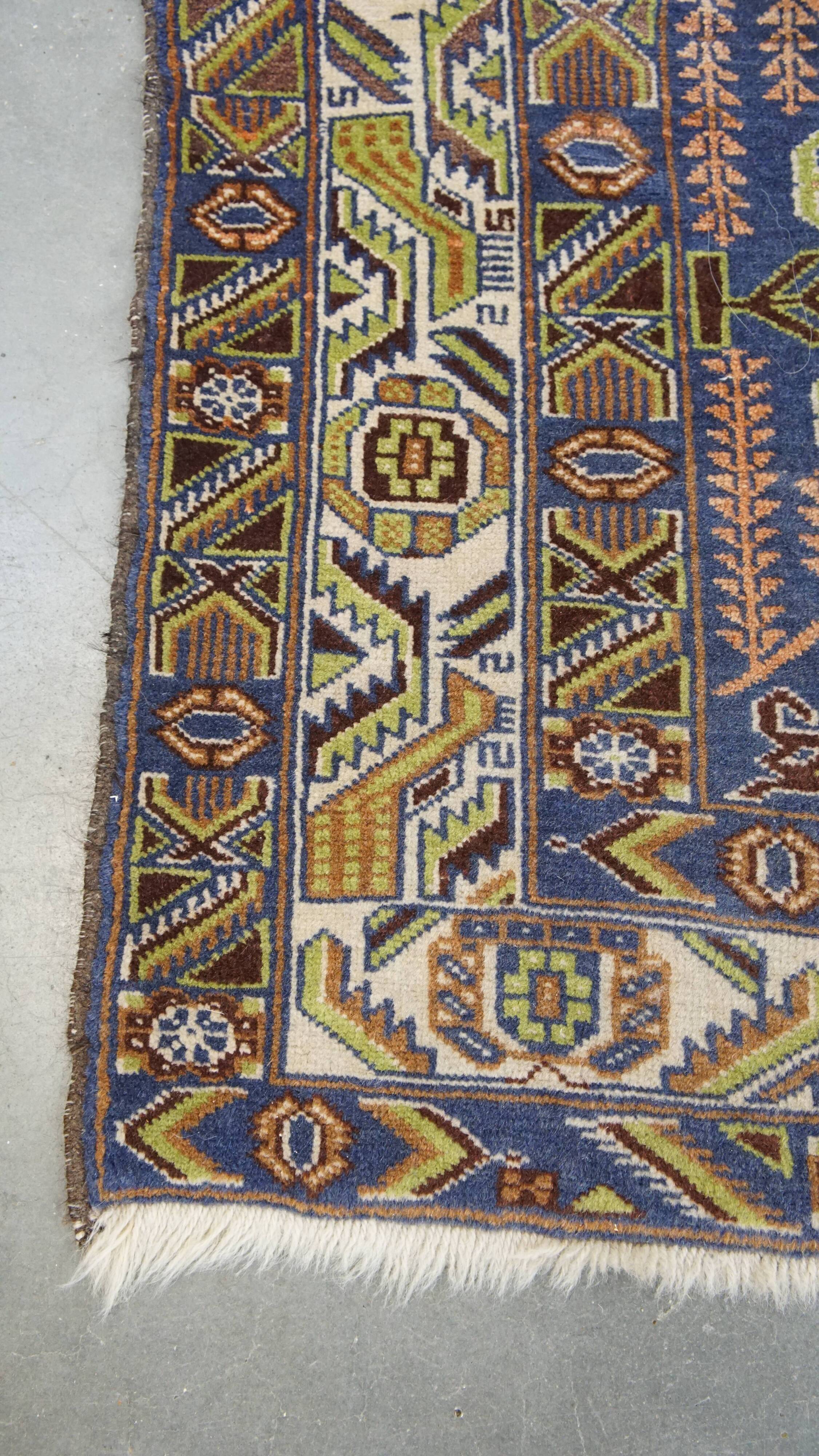 Hand-knotted rug with a pattern, 195 x 116 cm