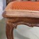 Caned chair in Louis XV style painted orange.