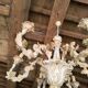 Florentine chandelier in carved wood with polychrome patina.
