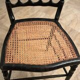 Cane chair in turned and blackened wood