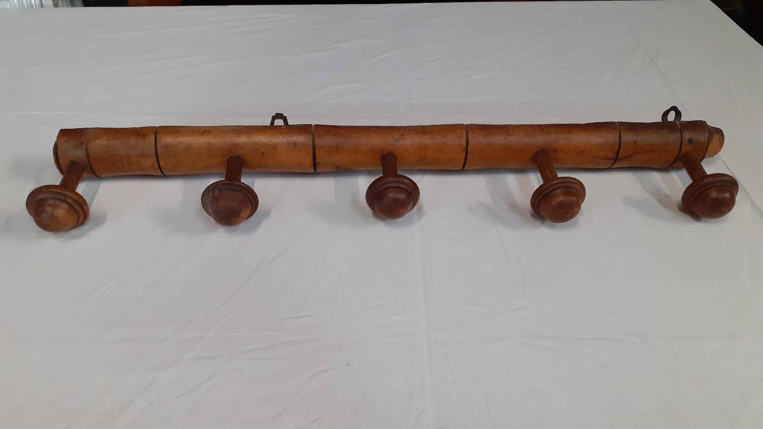 Wooden wall coat rack