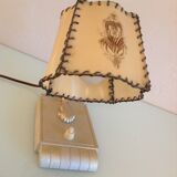 Brass bedside lamp and beige lampshade art deco style
