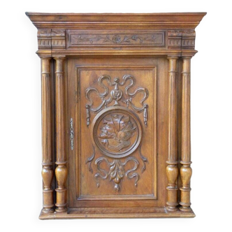 Carved wall paneling, bas relief.