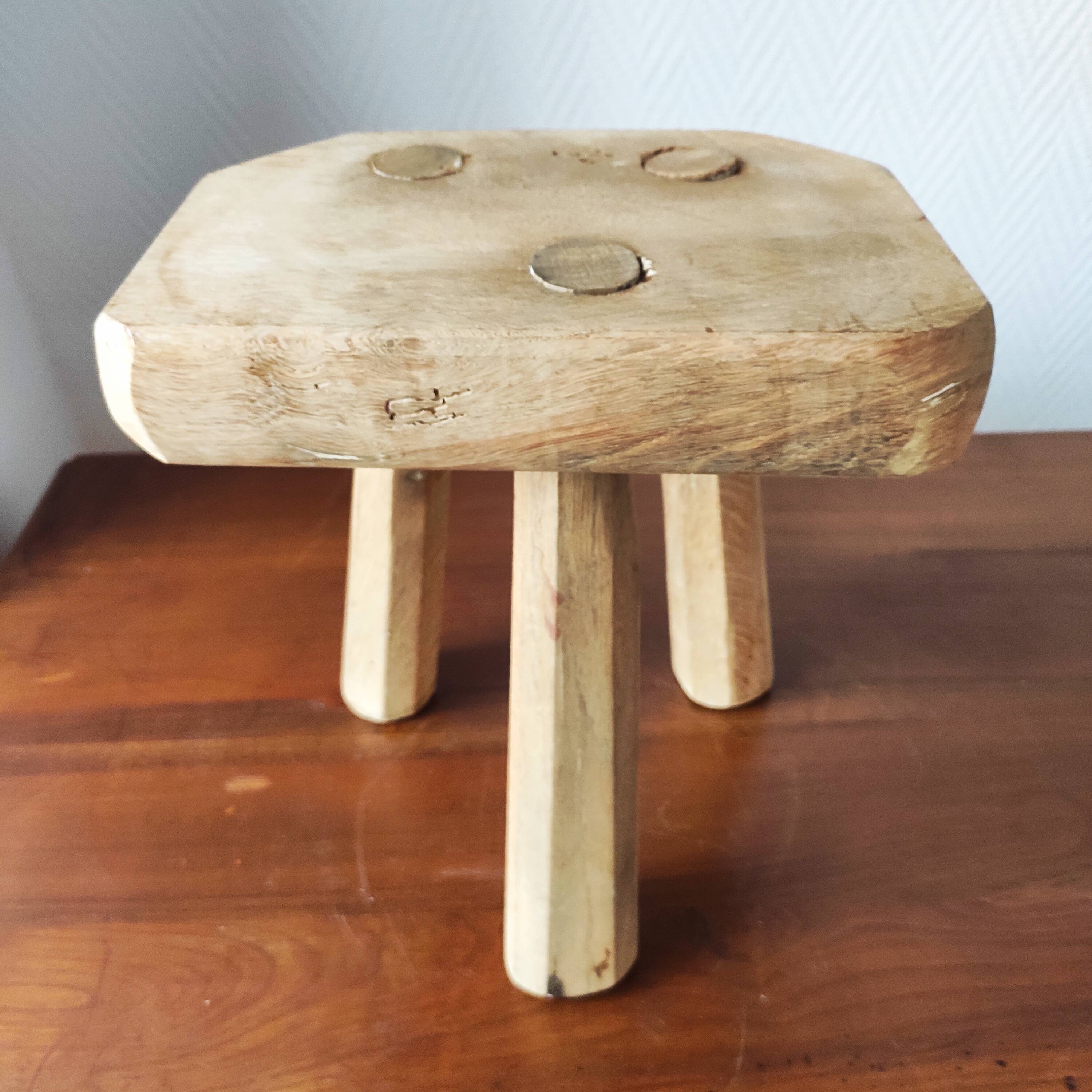 Vintage Danish brutalist tripod stool made of solid oak.