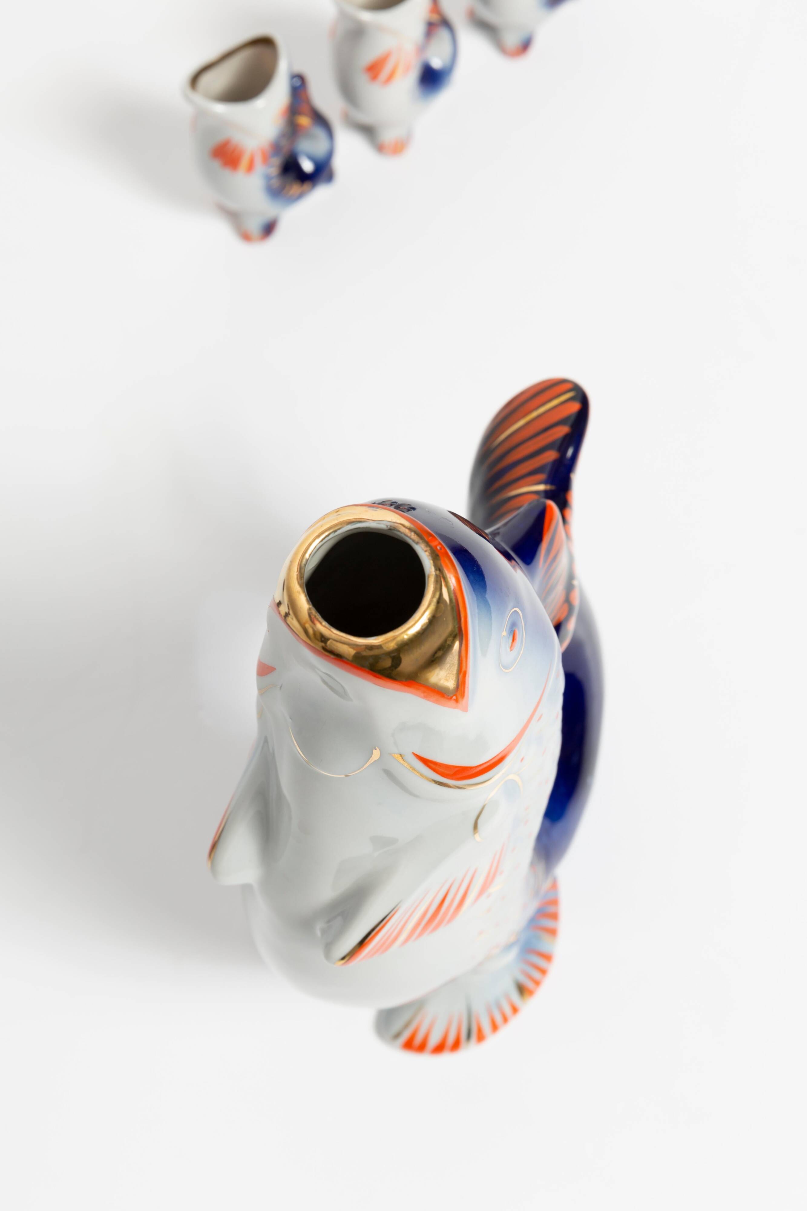 Set of 7 glasses and a carafe in glass and blue porcelain in Mid-Century Modern style.