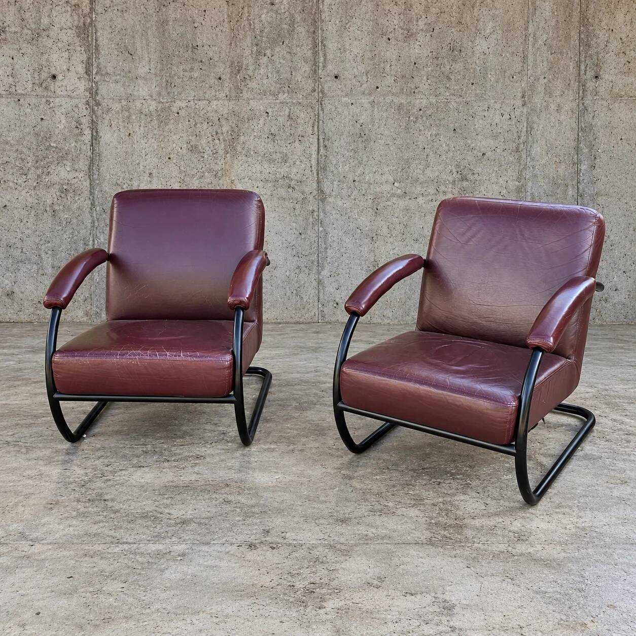2 x dark brown / bordeaux red / weighty leather club chairs / 1980s