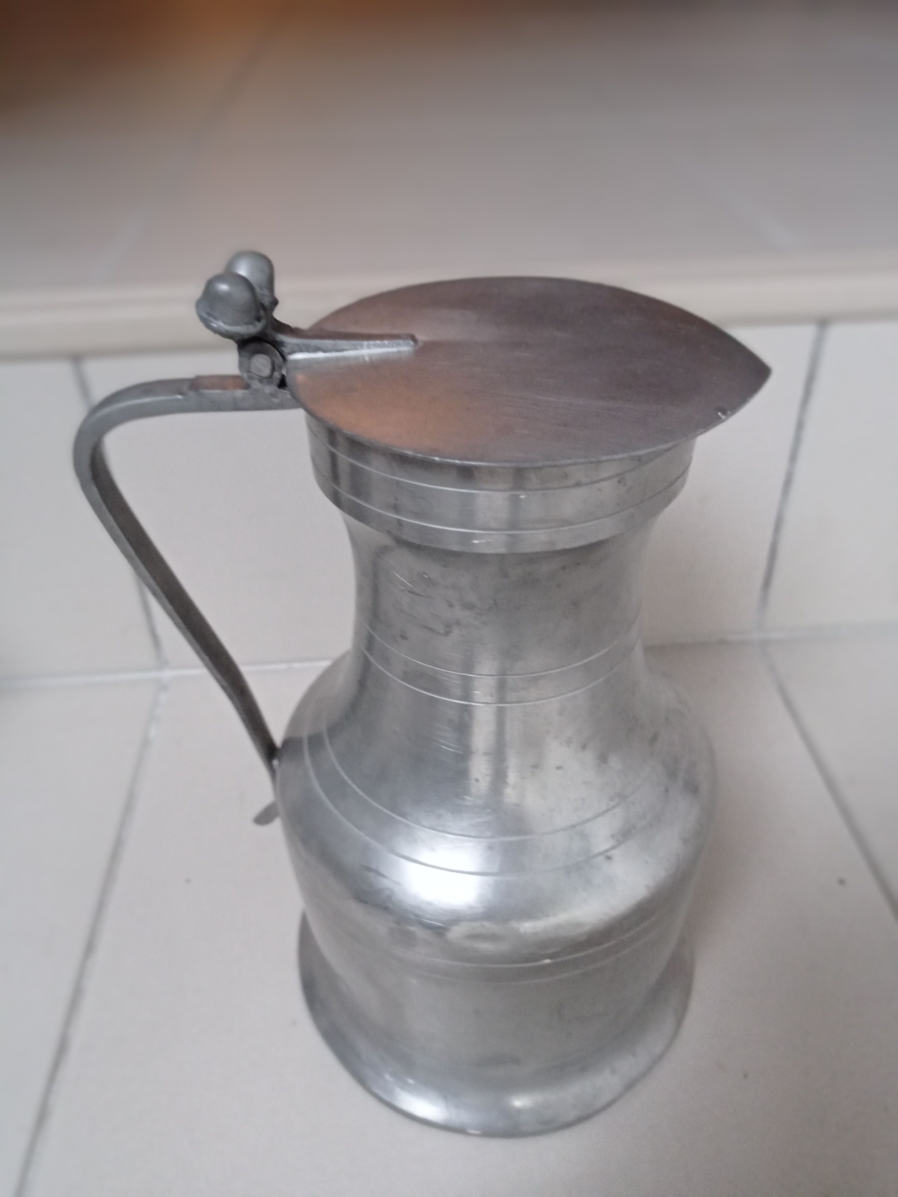 Tin pitcher
