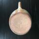 Beige stoneware pitcher with white drips