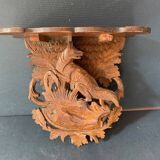 Black Forest carved wooden wall console, harness with wolf decoration