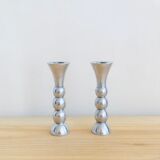 Pair of vintage cast aluminum candle holders