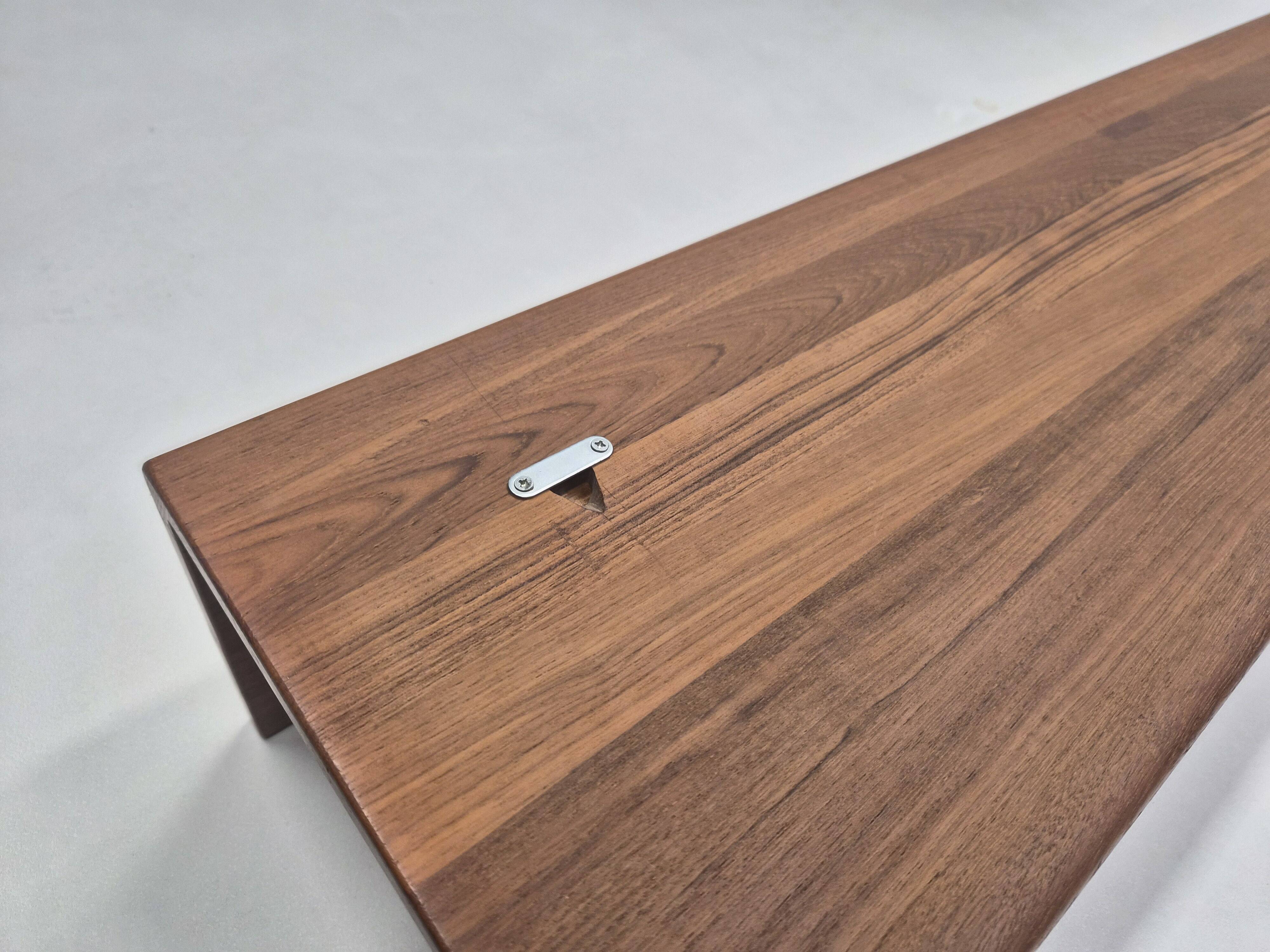 Solid teak wall shelf, 1960s Germany.