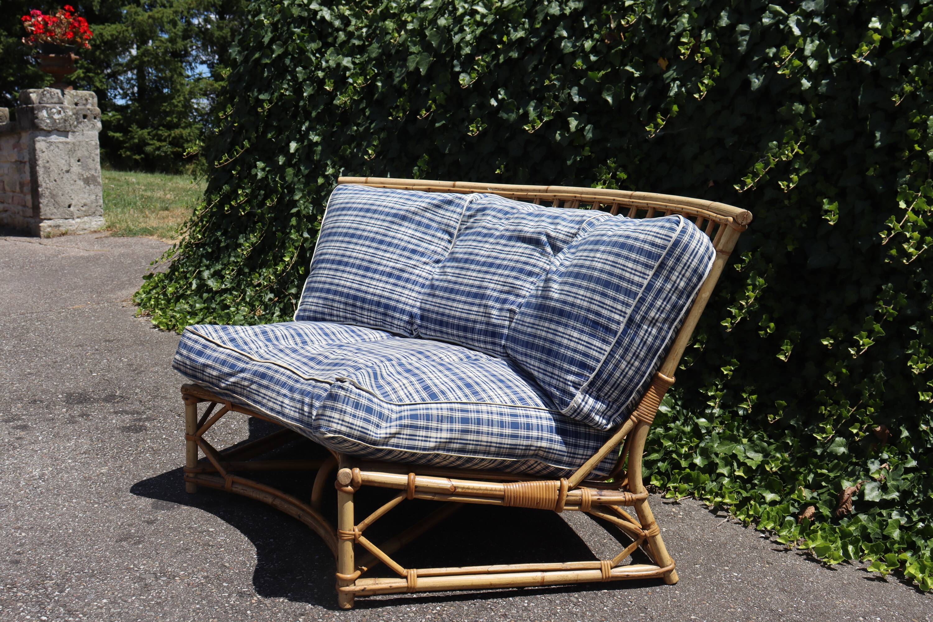Vintage rattan sofa by Audoux Minet