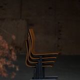 Set of 6 industrial stackable chairs by Niels Larsen, black metal and oak, 1960s.