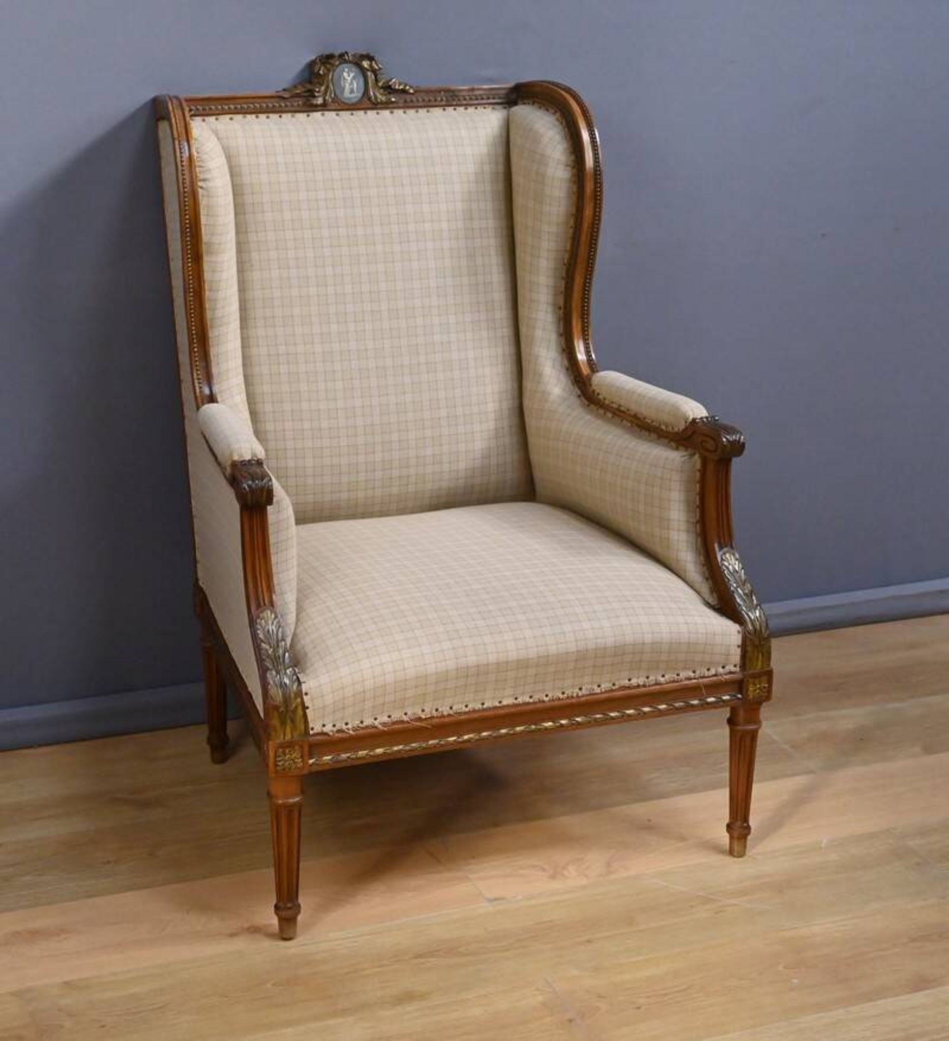 Wingback armchair in walnut, Louis XVI style – late 19th century
