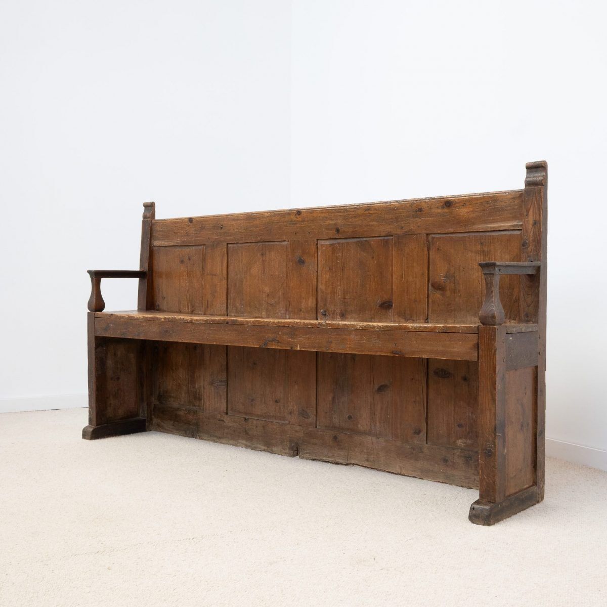 Old wooden bench with panelled backrest – 19th century