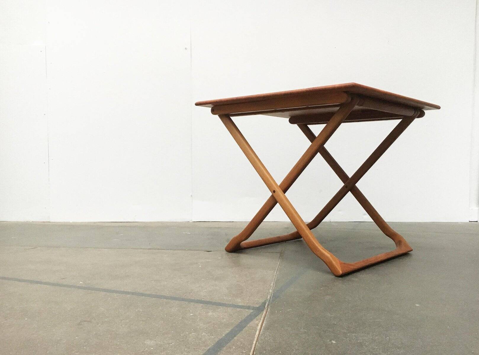 Danish folding table in teak from the mid-century by Juul Kristensen.