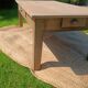 Large restored antique coffee table in solid oak.