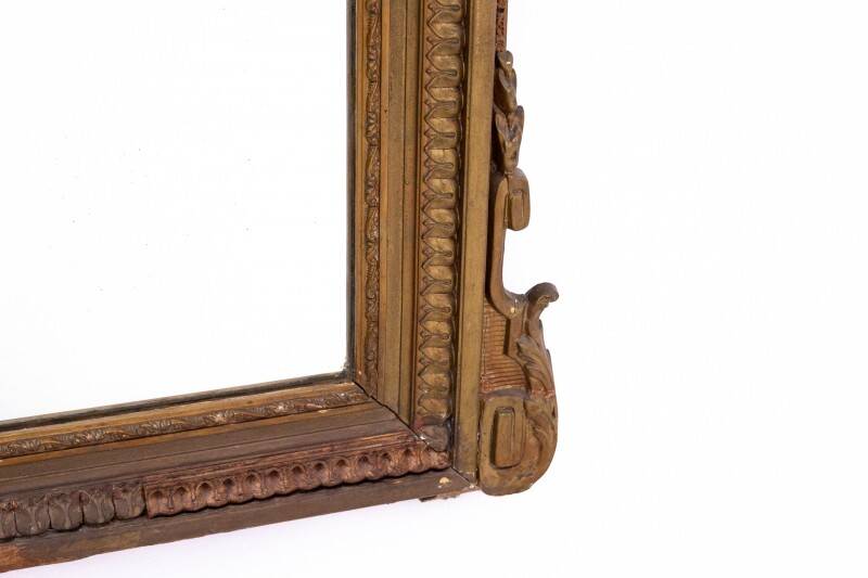 Large mirror in a gold frame, France.