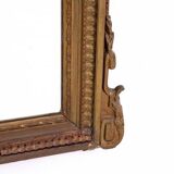 Large mirror in a gold frame, France.