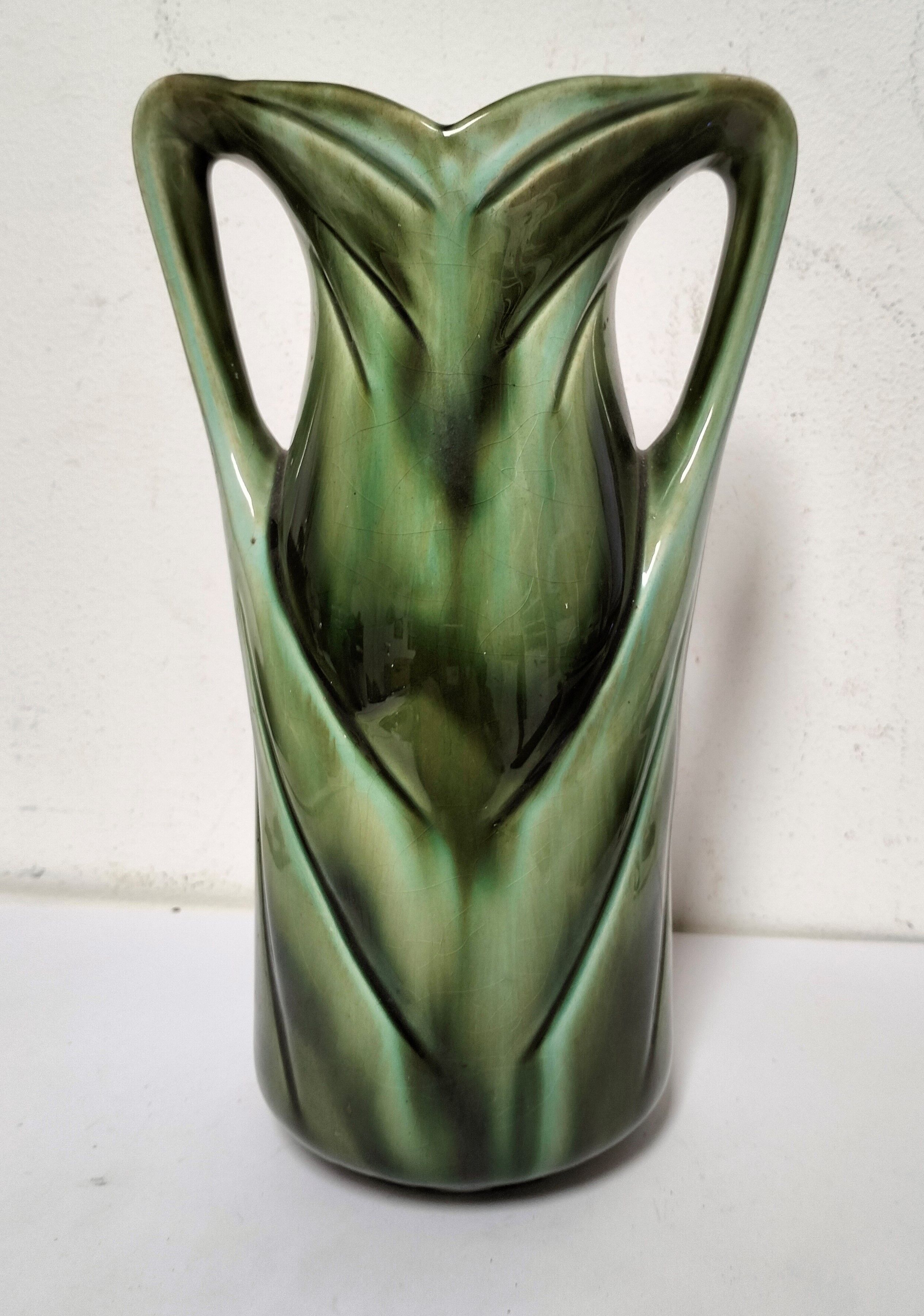 Old art nouveau earthenware slip vase