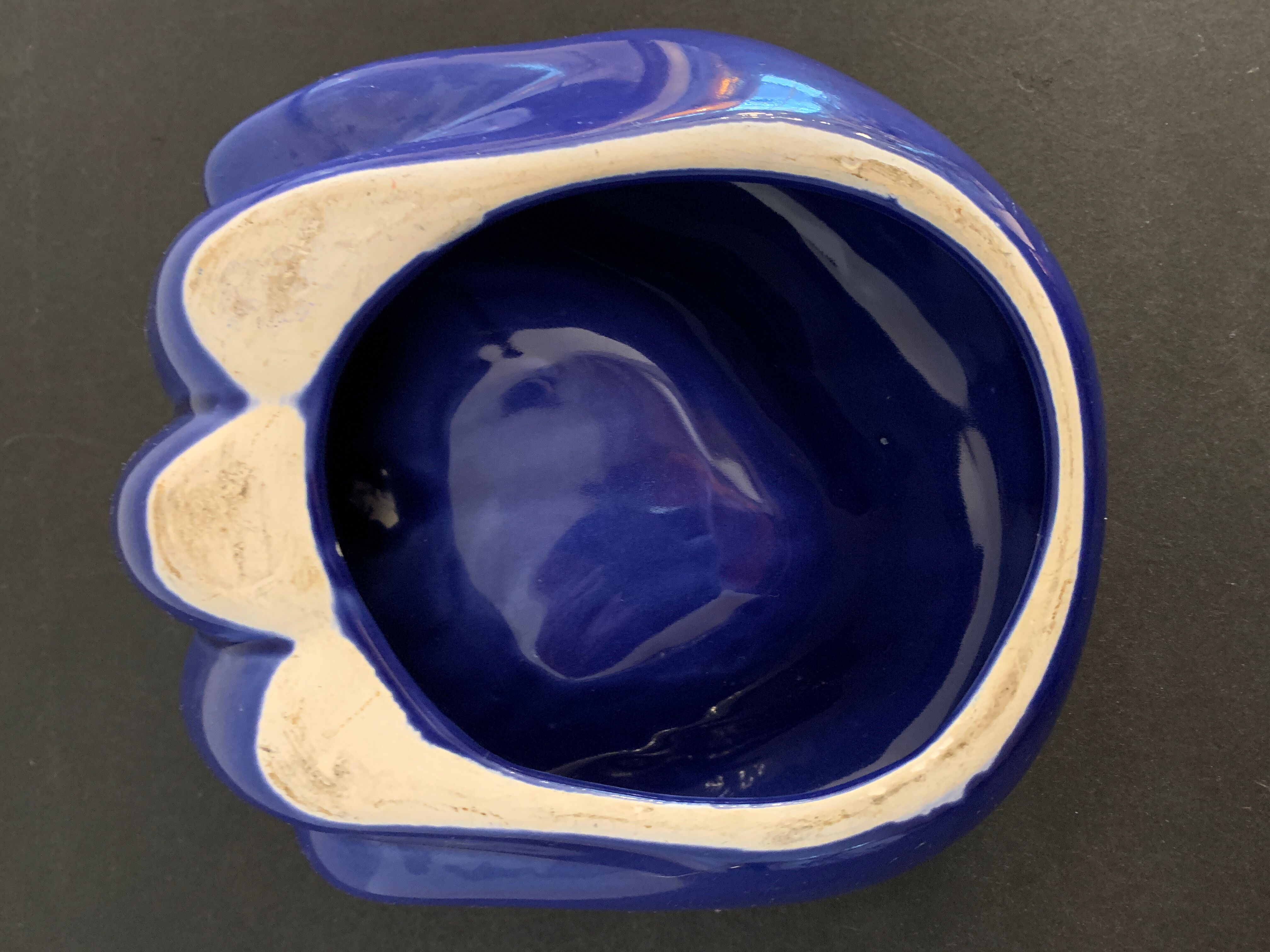 Ceramic ashtray, blue hand shape