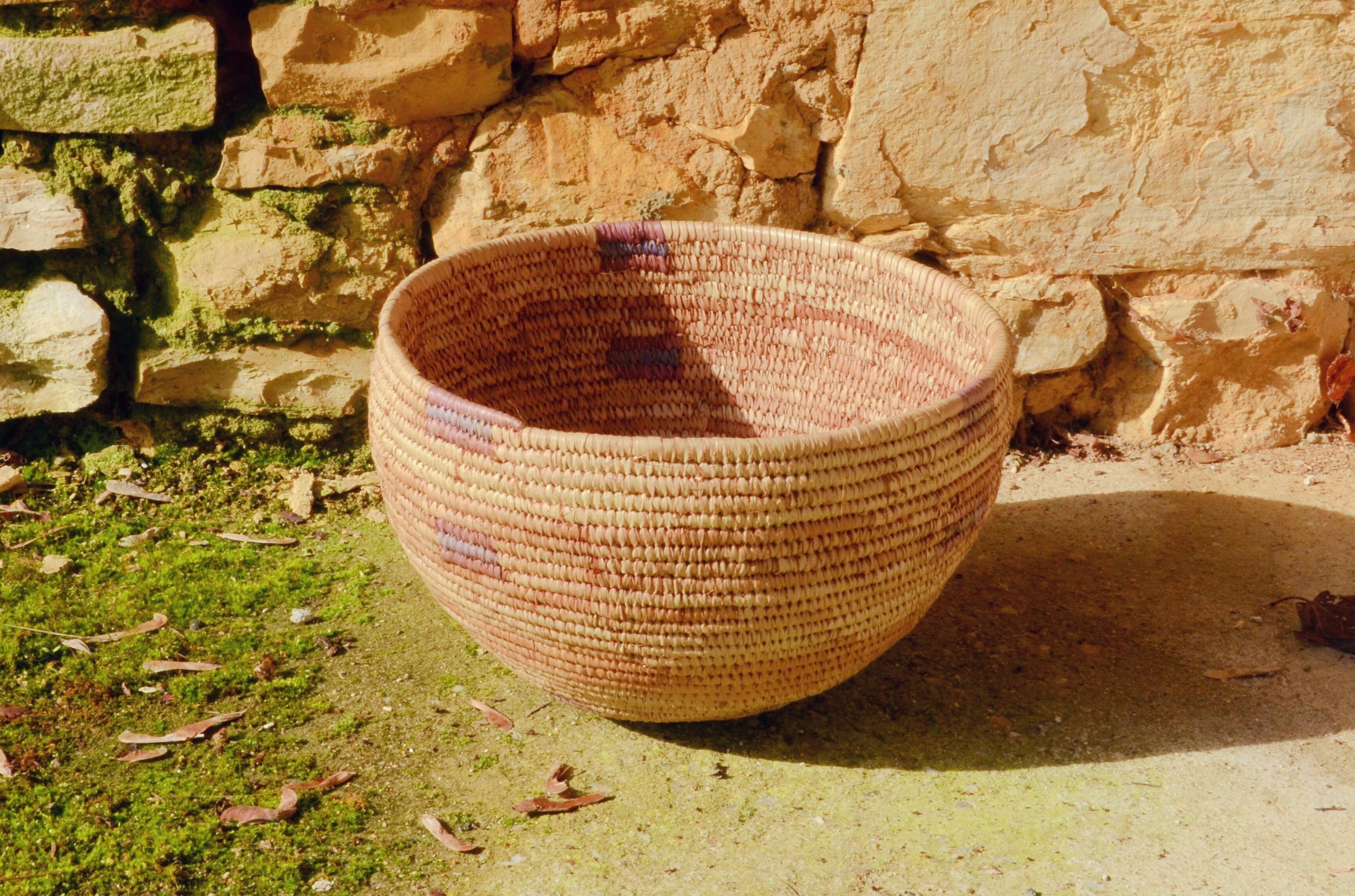 Handwoven basket made from rattan leaves, West Africa, 25x16cm