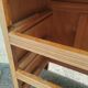 Vintage commode with tapered legs.