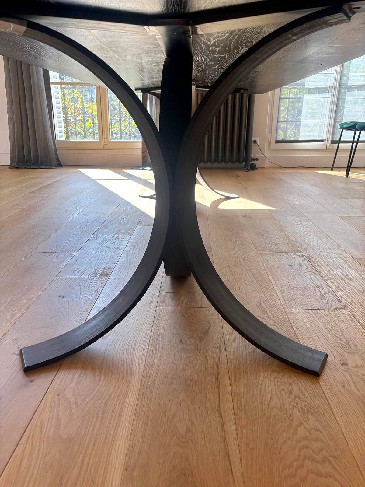 Large dining table in BS Style made of black oak and iron.