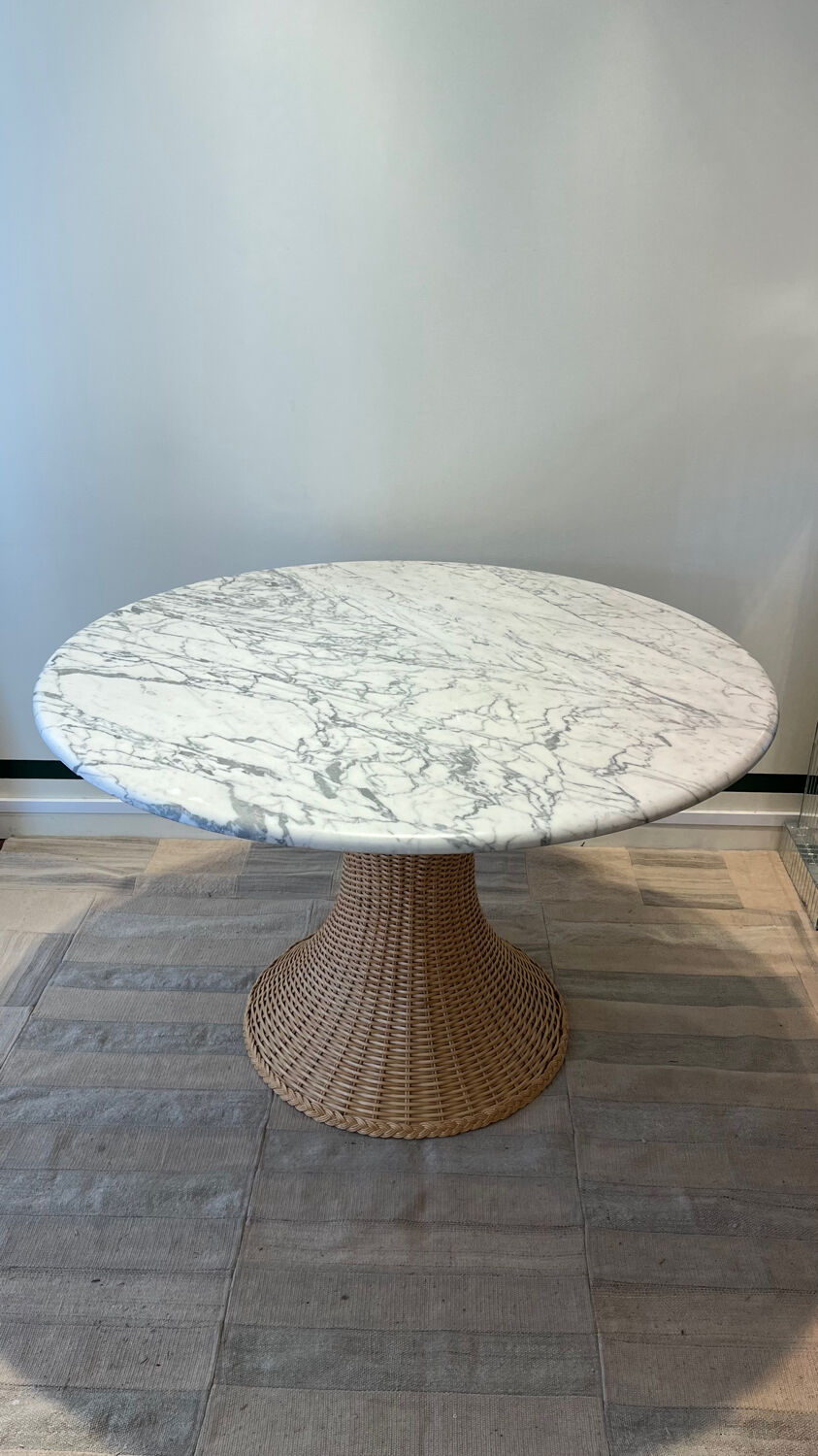 Marble and wicker dining table