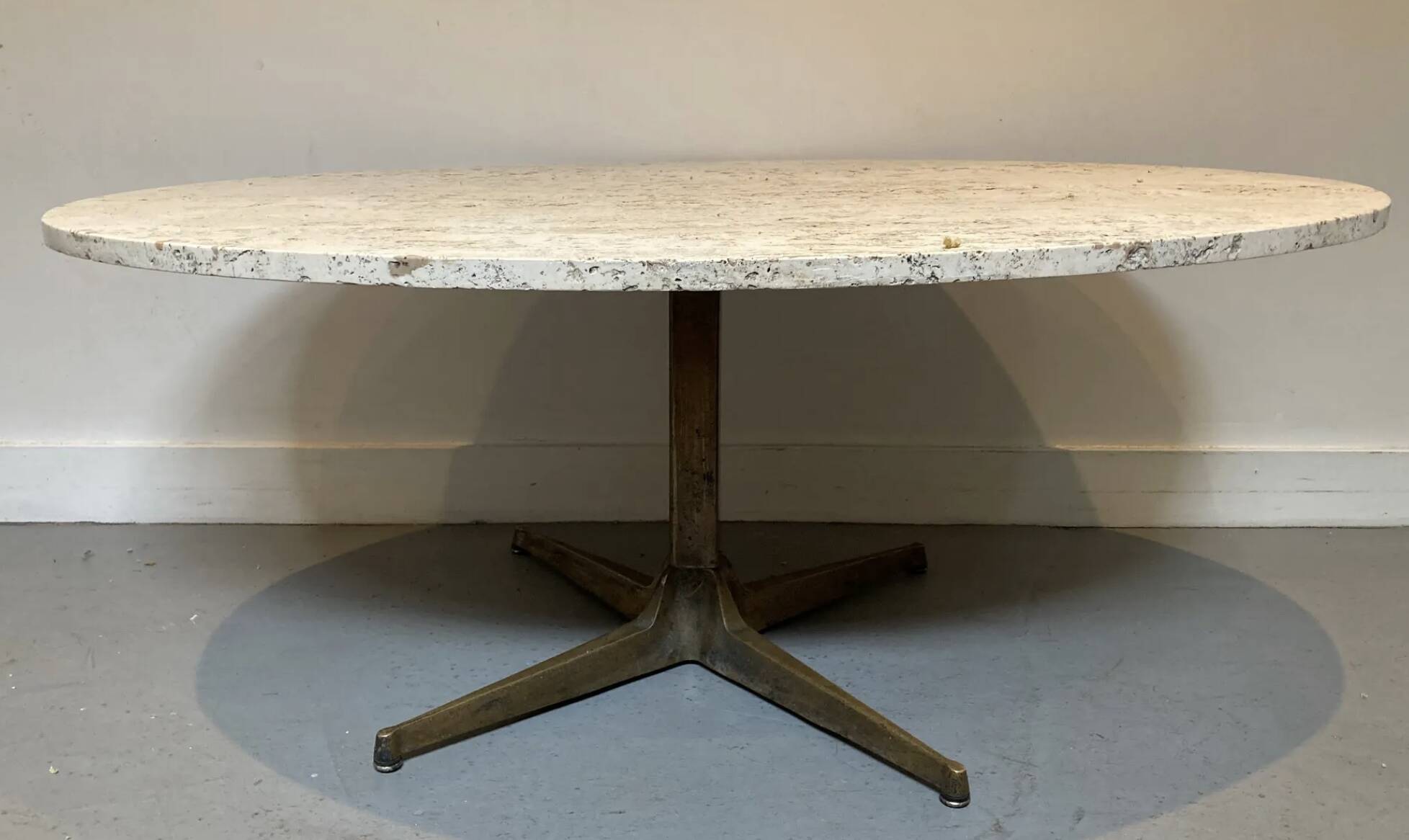 Oval coffee table in the style of Florence Knoll, marble/travertine top, piece.
