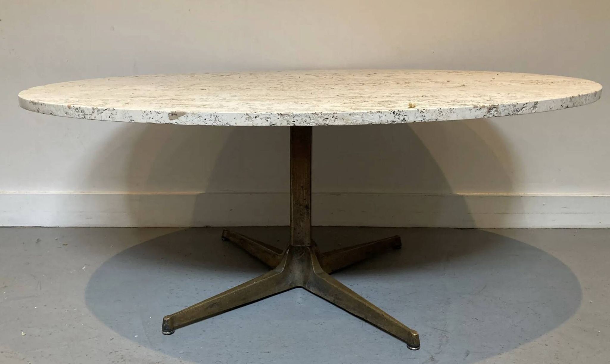 Oval coffee table in the style of Florence Knoll, marble/travertine top, piece.