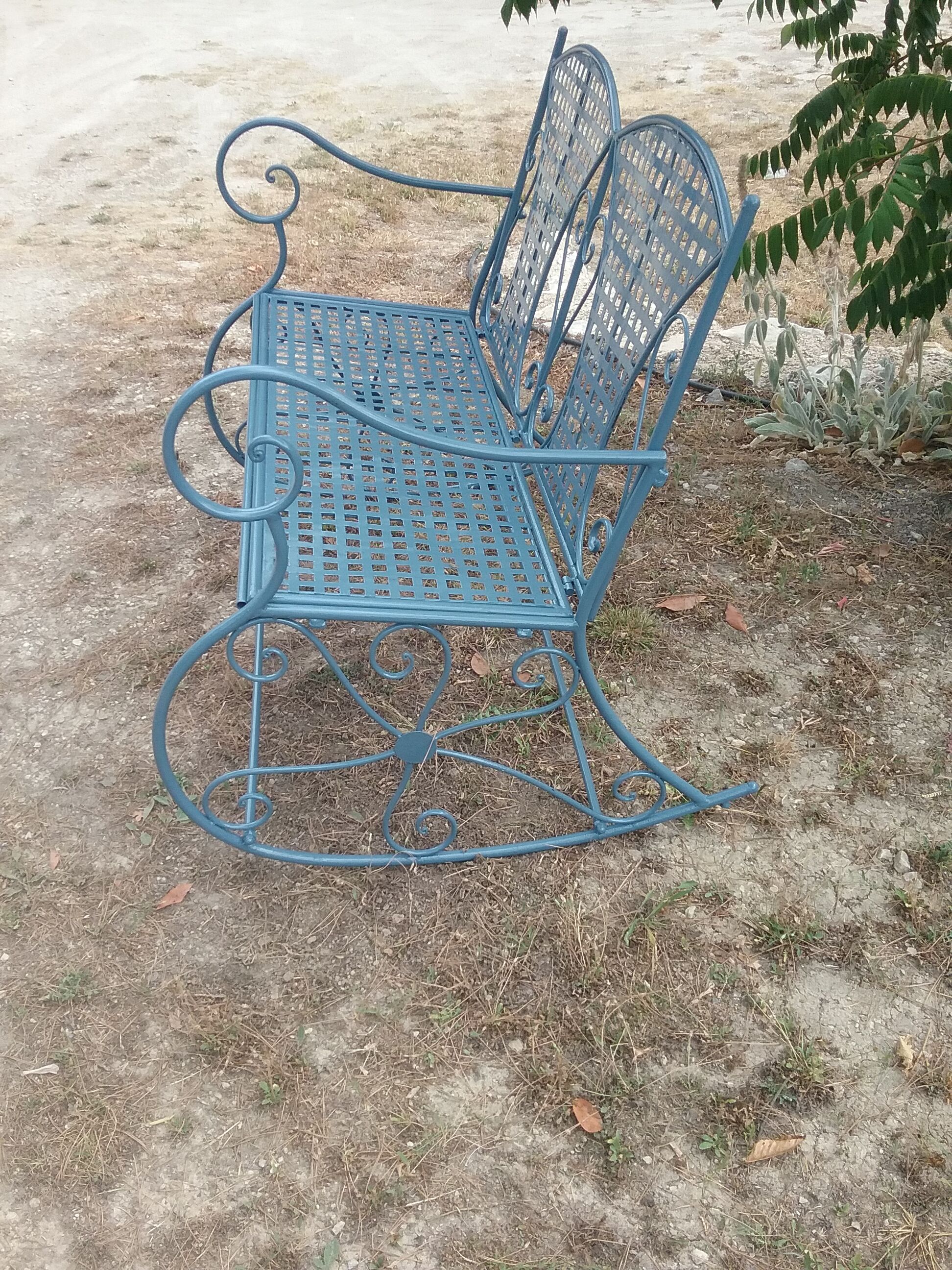 Large wrought iron rocking chair