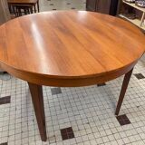Table ronde en bois avec rallonges intégrées