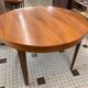 Table ronde en bois avec rallonges intégrées