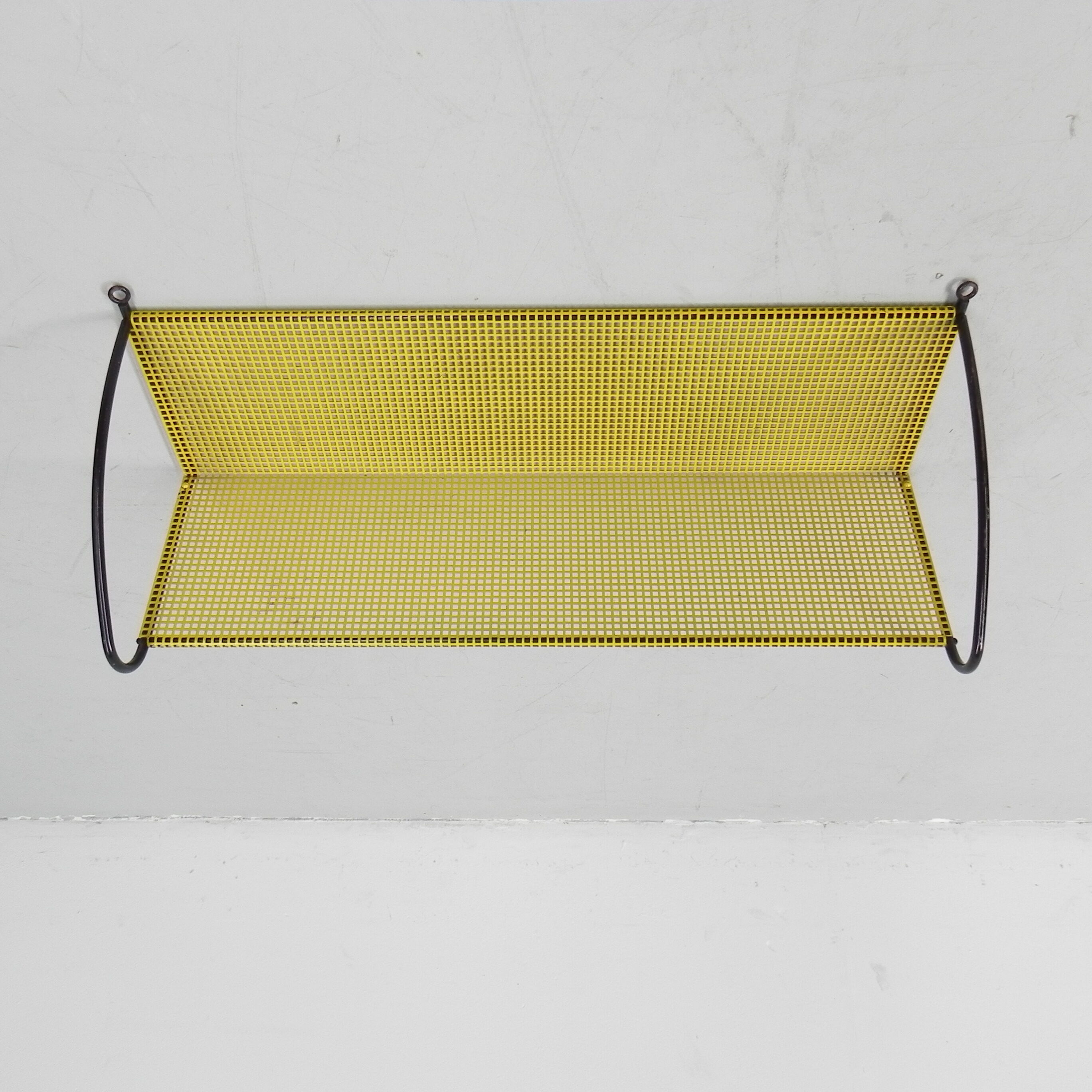 Pilastro wall rack with perforated steel plate
