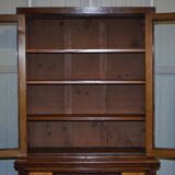 Light wood library with a secretary and leather surface.