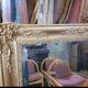 Antique gilded mirror from the 19th century, mercury mirror.