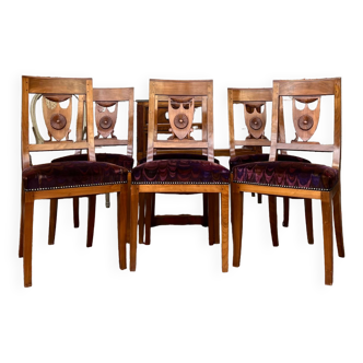 Suite of six empire-style natural wood chairs