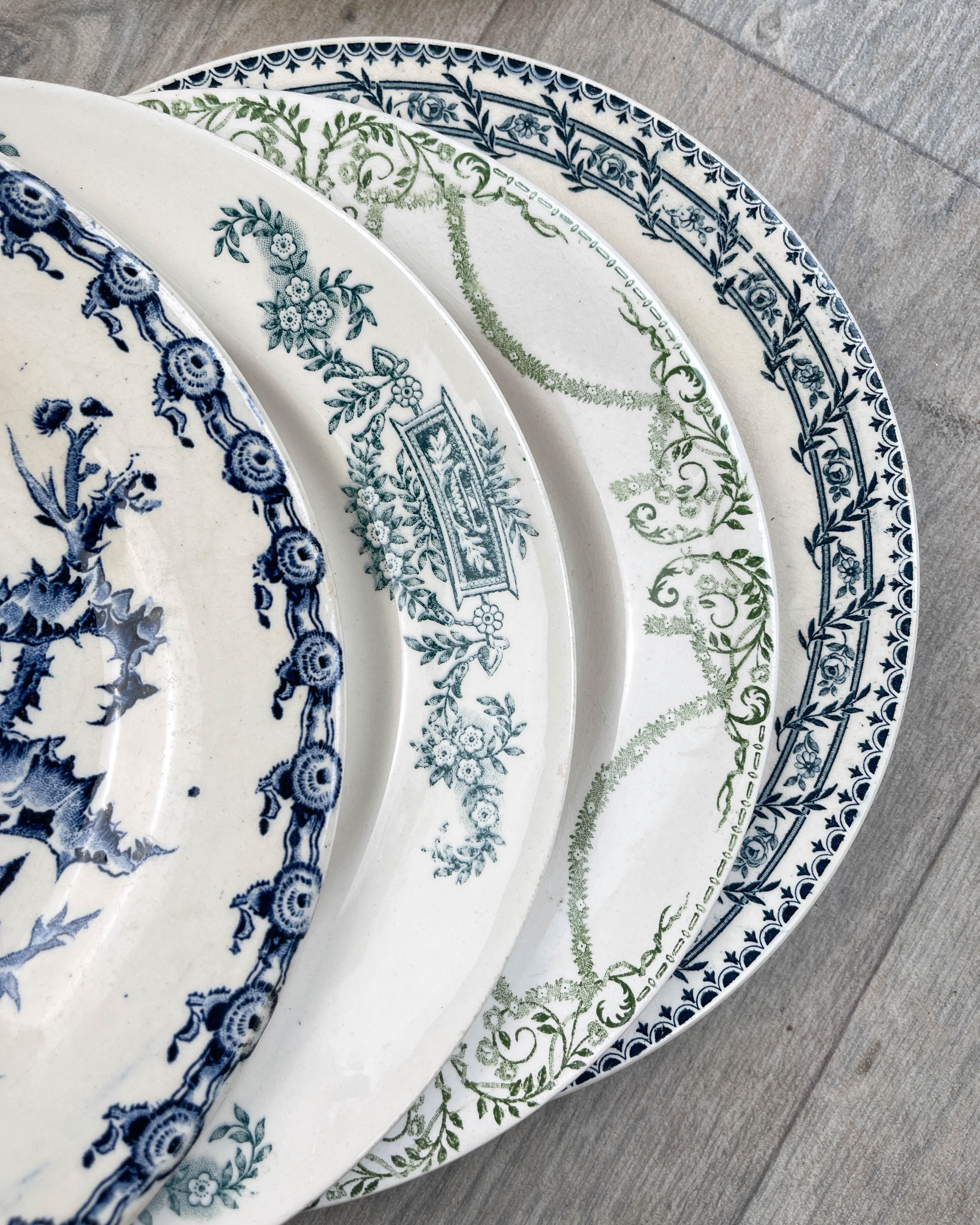 6 green and blue mismatched iron earth plates