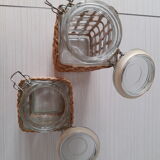 Pair of glass jars and rush