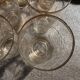 9 art-deco glasses in engraved crystal with gold trim