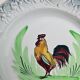 Pair of decorative deep plates with rooster design, St Amand vintage