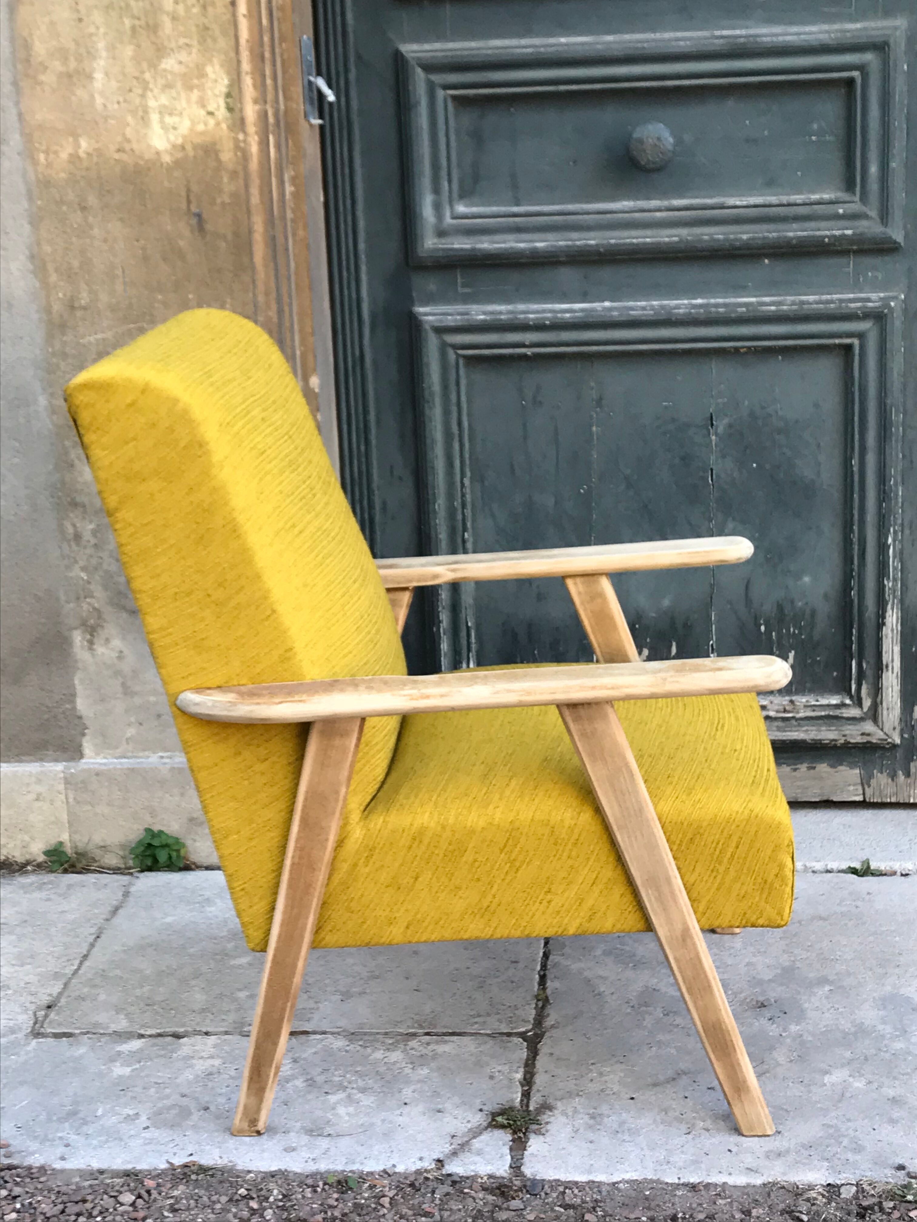 Fauteuil scandinave pieds compas