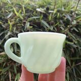 Set of green opaline cups
