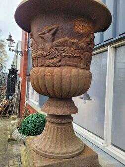 Large old cast iron planter on pedestal