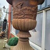 Large old cast iron planter on pedestal