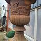 Large old cast iron planter on pedestal
