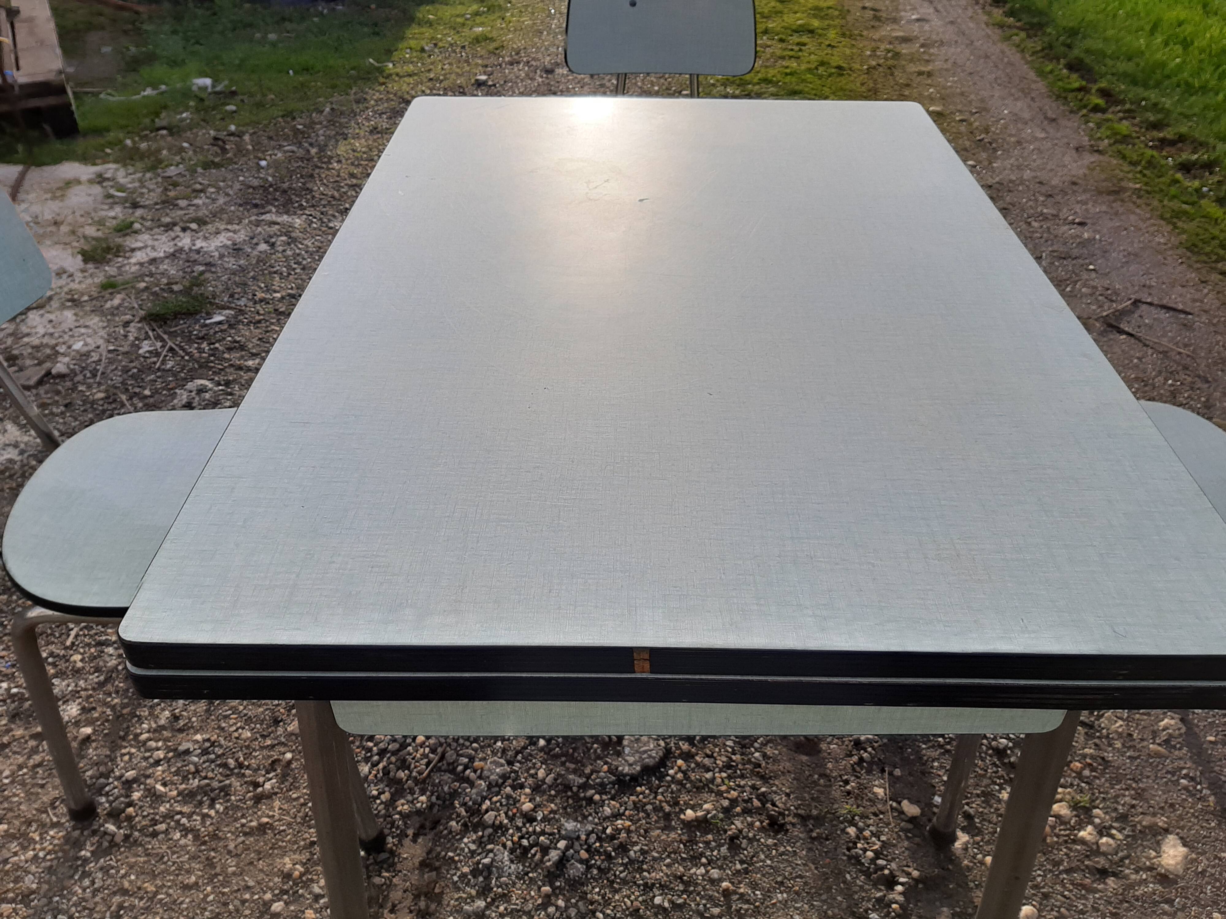 Table et 4 chaises formica vintage de marque Colmon