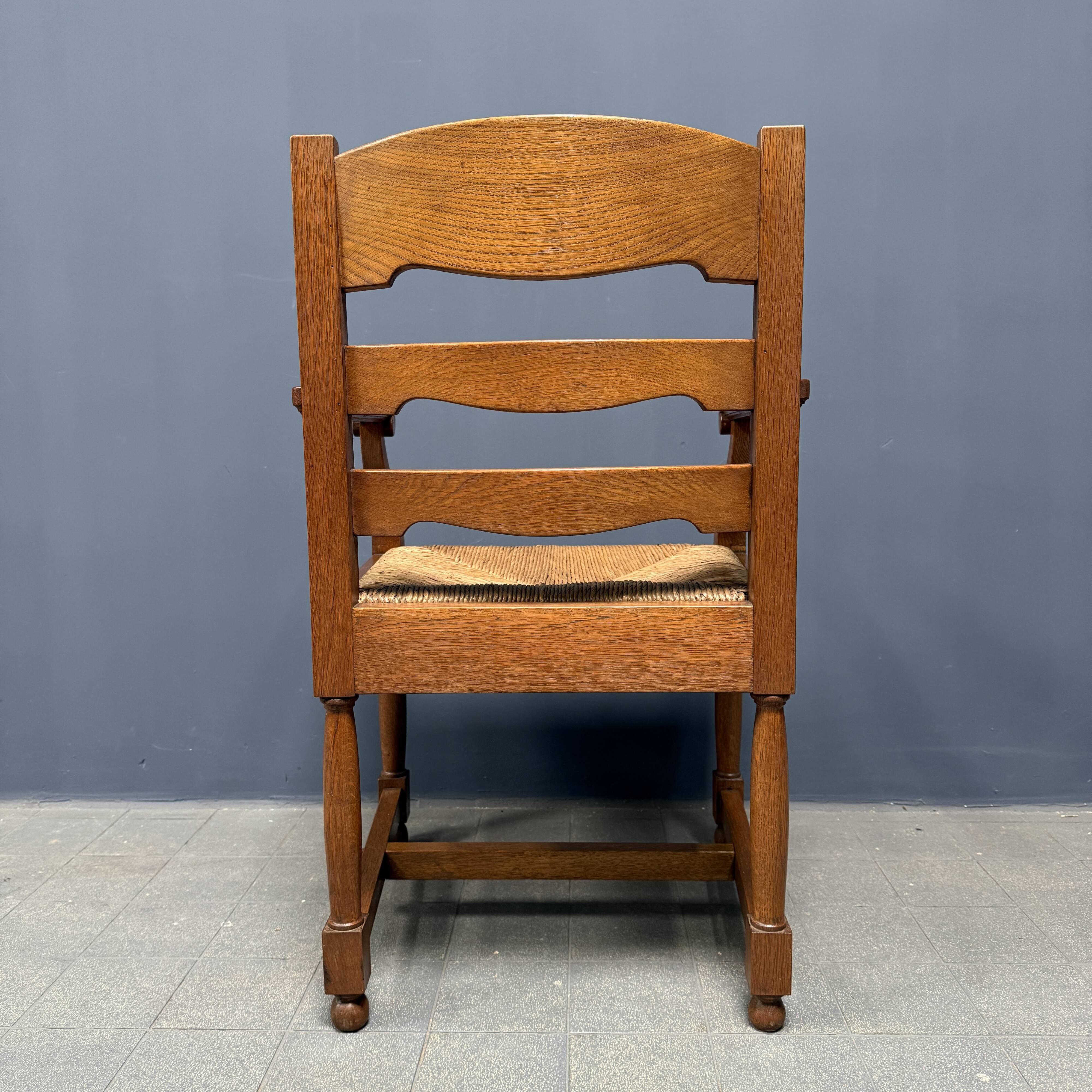 Set of two Dutch oak armchairs with rush seats